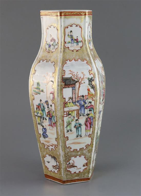 A Chinese famille rose mandarin hexagonal baluster vase, Qianlong period, H. 37.4cm, slight restoration to rim